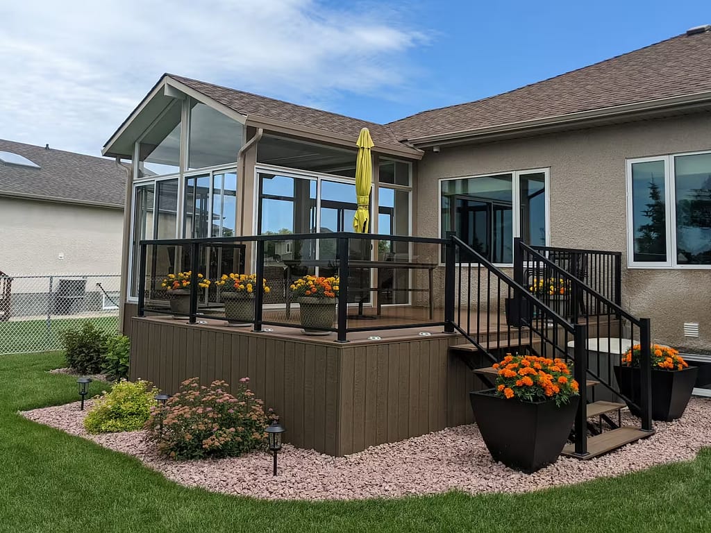 sandalwood and white gable sunroom with deck by SunCo in La Salle, Manitoba