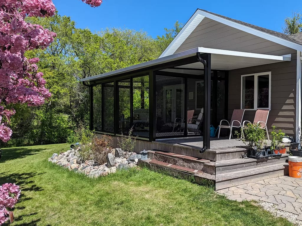 black sudio sunroom with awning by SunCo in East Selkirk, Manitoba