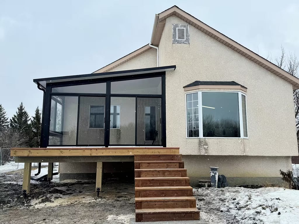 black studio sunroom by SunCo in Saint Andrews, Manitoba