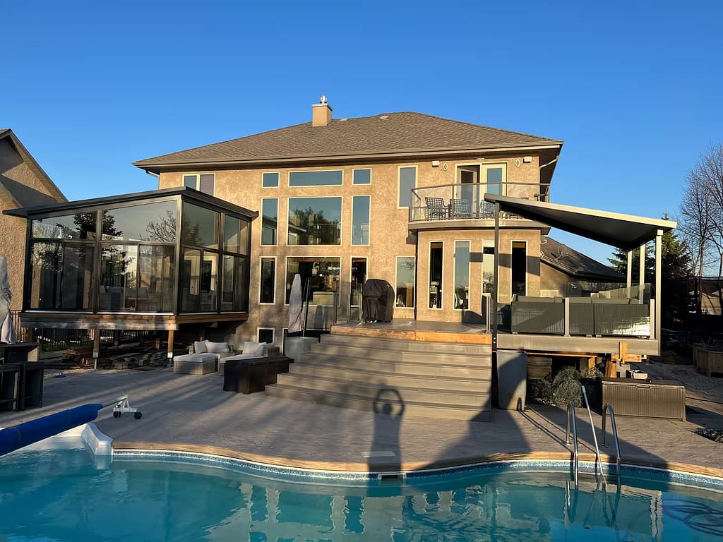 black studio sunroom and awning by SunCo in East St. Paul, Manitoba