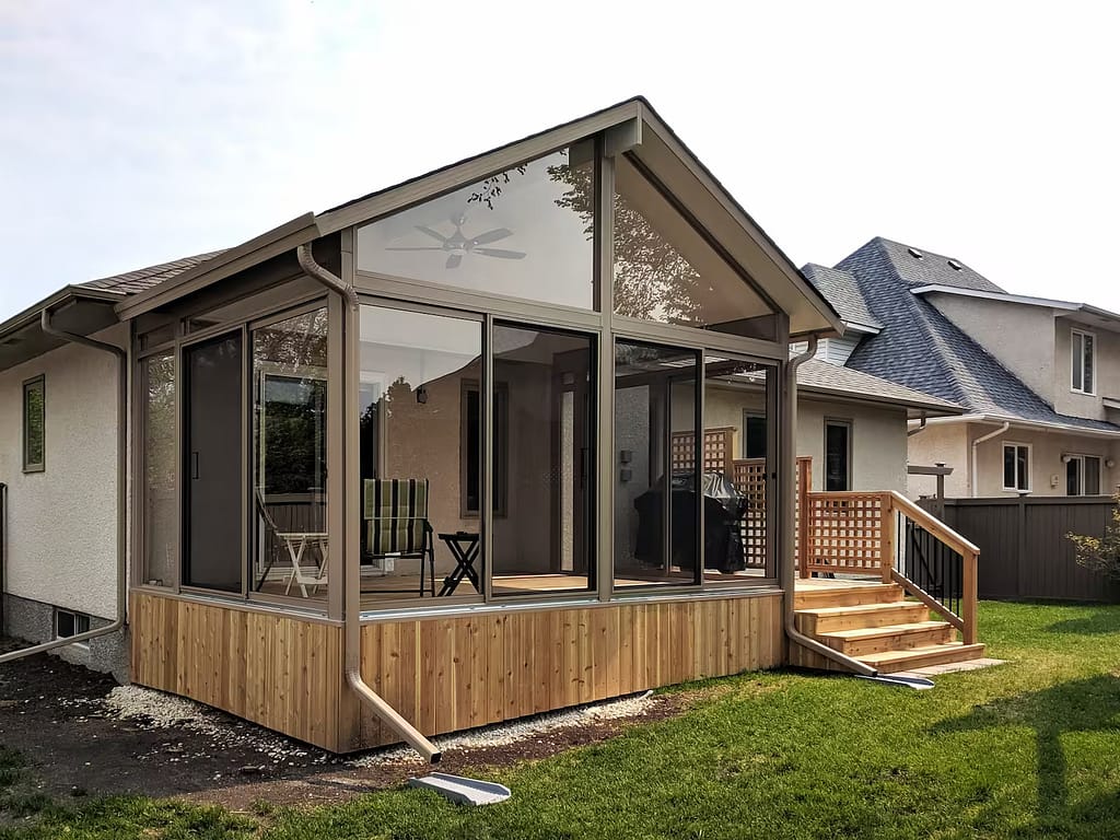 sandalwood gable sunroom with cedar deck by SunCo in Normand Park, Winnipeg