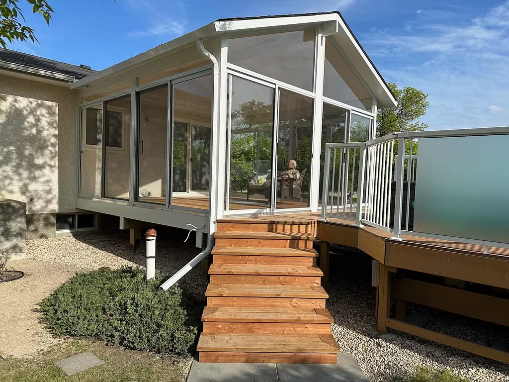 white gable sunroom by SunCo in Saint Adolphe, Manitoba