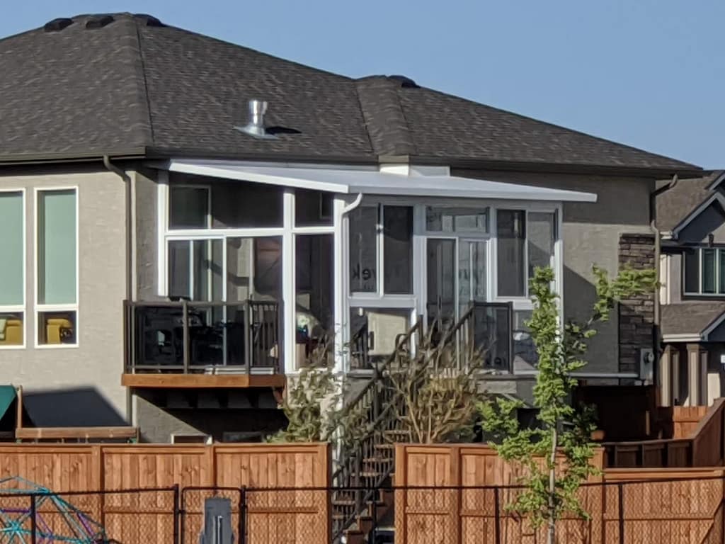 white studio sunroom by SunCo in South Pointe, Winnipeg