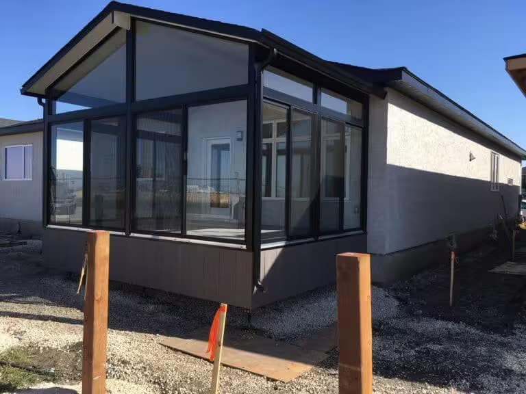 black gable sunroom by SunCo in Camp Manitou, Winnipeg