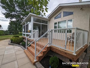 White studio sunroom with treated wood deck and white aluminum picket railings East st Paul 3