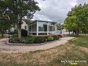 White studio sunroom with treated wood deck and white aluminum picket railings East st Paul 5